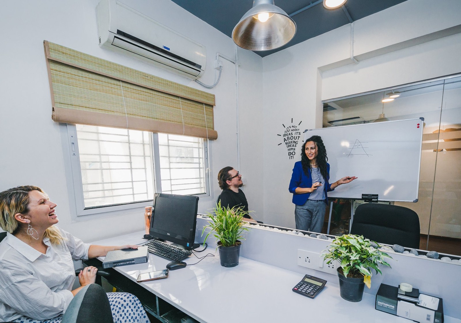 Cospaze Hebbal — meeting room with whiteboard session
